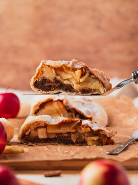 Classic apple strudel dessert with flaky pastry and cinnamon