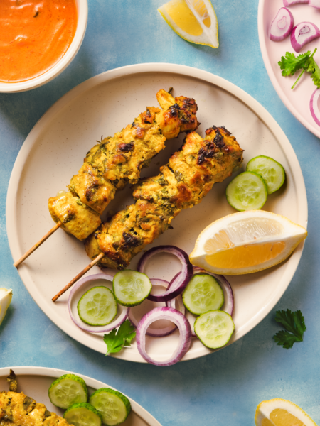 Grilled chicken malai tikka skewers marinated in yogurt and cream