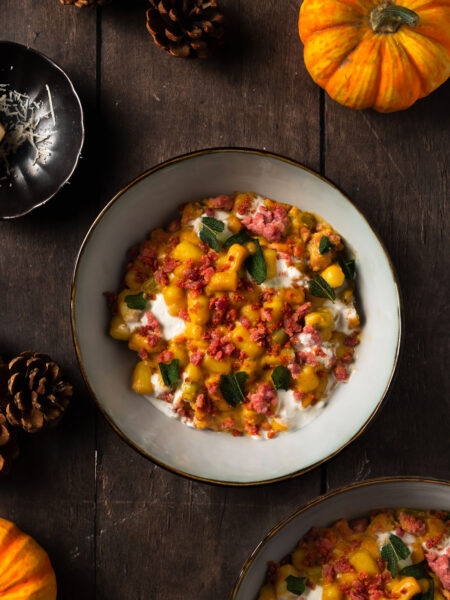 Pumpkin gnocchi in a creamy sauce with salsiccia and sage
