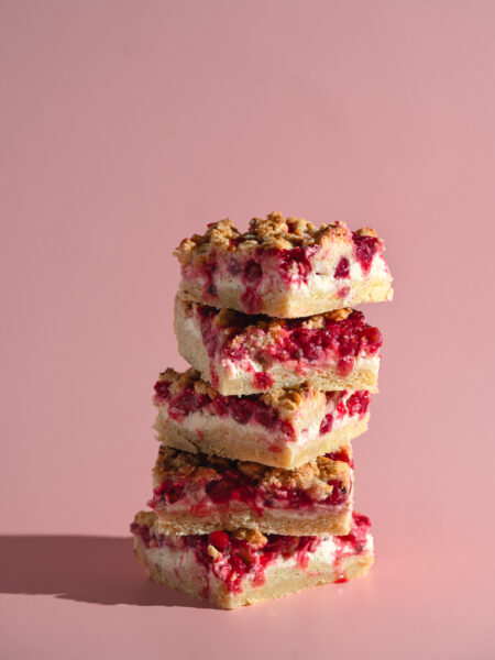 Slice of German Streuselkuchen crumb cake with red currants