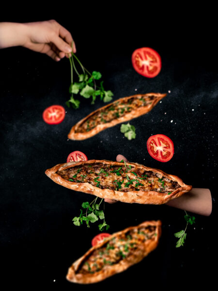 Boat-shaped Turkish pide flatbread with cheese filling