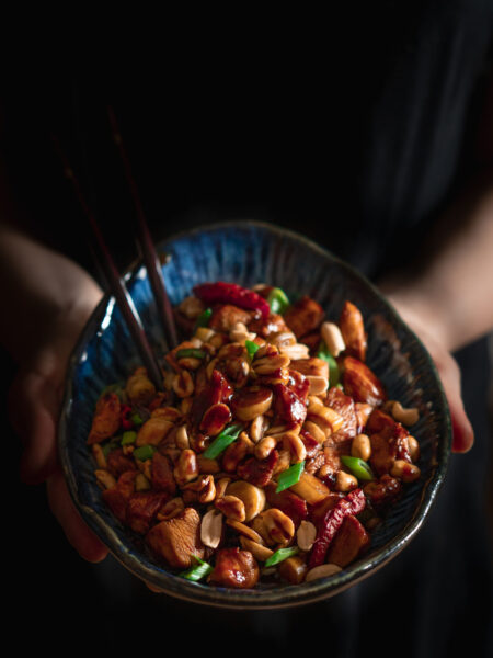 Easy Kung Pao chicken stir-fry served with rice and roasted peanuts