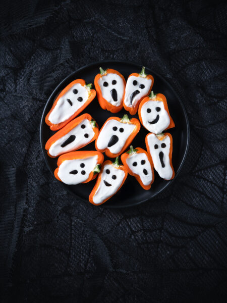 Halloween mini stuffed peppers which look like ghosts