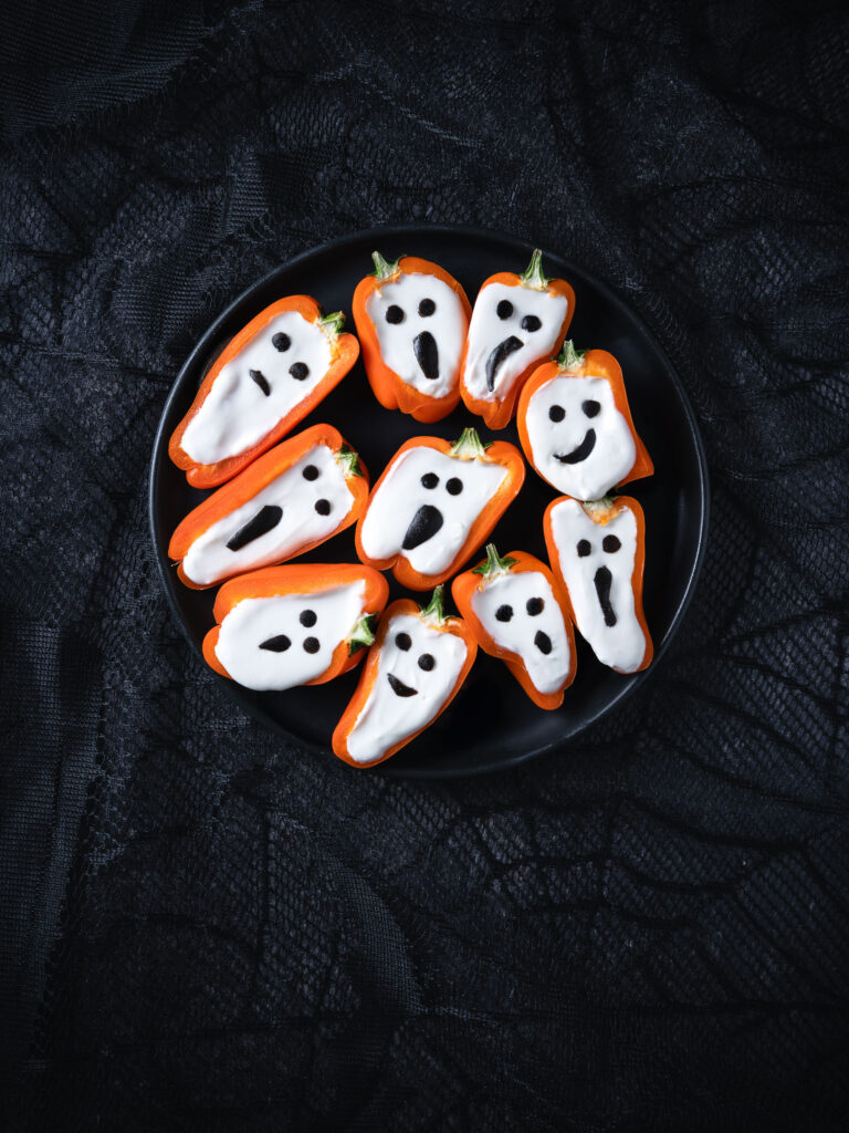 Halloween mini stuffed peppers which look like ghosts
