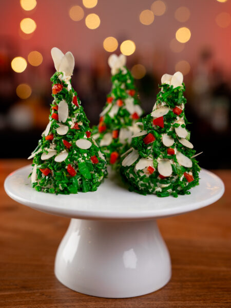 Easy cream cheese Christmas trees appetizer made with cheddar, cream cheese, pesto and herbs