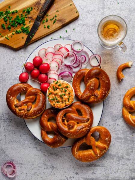 Creamy Bavarian Obatzda cheese spread served with pretzels, a classic Oktoberfest and holiday party dish.
