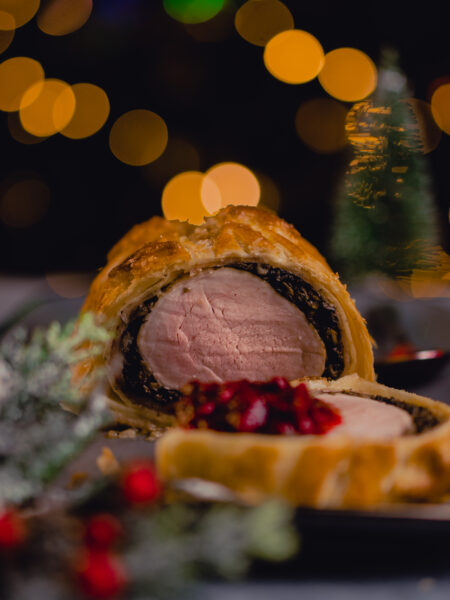 Juicy pork Wellington wrapped in golden puff pastry, a perfect centerpiece for Christmas dinner.