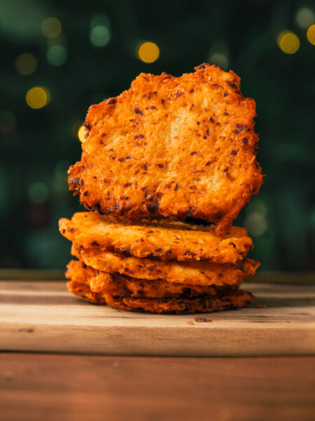 Traditional German potato pancakes fried until golden and crispy, also known as Reibekuchen
